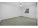 Bedroom with carpet, ceiling fan, and a window offering natural light at 4430 Eastport Blvd. # L5, Little River, SC 29566