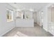 Bright and airy living space connects to kitchen, creating an inviting atmosphere at 4430 Eastport Blvd. # L5, Little River, SC 29566