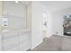 Spacious living room featuring built in shelving and a sliding glass door with lots of natural light at 4430 Eastport Blvd. # L5, Little River, SC 29566