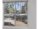 Exterior neighborhood view from window featuring trees and a home at 4430 Eastport Blvd. # L5, Little River, SC 29566