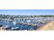 Scenic aerial view of the marina, highlighting the extensive boat docks and surrounding buildings at 4440 Nassau Ct. # 502, Little River, SC 29566
