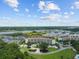Aerial view showcases the condominium complex, marina, and surrounding natural beauty at 4440 Nassau Ct. # 502, Little River, SC 29566