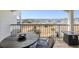 Balcony with dining table and seating featuring views of the marina and water at 4440 Nassau Ct. # 502, Little River, SC 29566