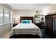 Comfortable bedroom with a large window, a dresser, and a warm, inviting atmosphere at 4440 Nassau Ct. # 502, Little River, SC 29566