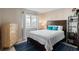 Cozy bedroom with a window view, a dresser, and natural lighting at 4440 Nassau Ct. # 502, Little River, SC 29566