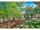 Lush greenery and a view of other units from the backyard area at 4466 Little River Inn Ln. # 906, Little River, SC 29566