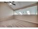 This spacious bedroom has high ceilings and a cozy carpeted floor at 4466 Little River Inn Ln. # 906, Little River, SC 29566