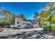 Condo complex showcasing mature trees and exterior details at 4466 Little River Inn Ln. # 906, Little River, SC 29566