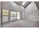 Light-filled living space with sliding glass doors to the outside at 4466 Little River Inn Ln. # 906, Little River, SC 29566