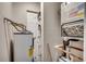 Hot water tank in utility room with door access and HVAC system at 4466 Little River Inn Ln. # 906, Little River, SC 29566