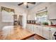 Bright kitchen featuring white cabinets, stainless steel appliances, wood countertops and island with wooden top at 451 Holly View Ln., Loris, SC 29569