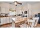 Bright kitchen featuring white cabinets, butcher block countertops, ceiling fan and stainless steel appliances at 451 Holly View Ln., Loris, SC 29569