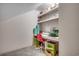 Bright and functional office space featuring a built-in desk, shelving, and comfortable seating at 451 Holly View Ln., Loris, SC 29569