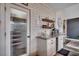 Well-organized pantry with glass door, shelving, and easy access to kitchen essentials at 451 Holly View Ln., Loris, SC 29569