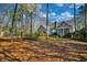 Beautiful backyard featuring a patio, outdoor grill, and screened-in porch at 4514 Wagon Run Circle, Murrells Inlet, SC 29576