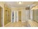 Bright bathroom featuring a glass shower, walk-in closet, and granite countertop vanity at 4514 Wagon Run Circle, Murrells Inlet, SC 29576