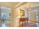 Inviting foyer with hardwood floors, elegant lighting, and a decorative console table at 4514 Wagon Run Circle, Murrells Inlet, SC 29576