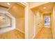Upstairs hallway with carpet floors and multiple closets for storage at 4514 Wagon Run Circle, Murrells Inlet, SC 29576