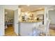 Modern kitchen featuring granite countertops, stainless steel appliances, and seating at the bar at 4514 Wagon Run Circle, Murrells Inlet, SC 29576
