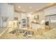 Spacious kitchen featuring granite countertops, stainless steel appliances and light wood flooring at 4514 Wagon Run Circle, Murrells Inlet, SC 29576