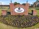 Brick community entrance sign with flower beds welcomes visitors to Waterway Palms Plantation at 5023 Middleton View Dr., Myrtle Beach, SC 29579