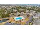 Aerial view showcasing the community pool, playground, and well-maintained residential homes at 503 20Th Ave. N # 45D, North Myrtle Beach, SC 29582