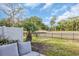 Green backyard featuring a lush green lawn and a charming patio with comfortable outdoor seating at 503 20Th Ave. N # 45D, North Myrtle Beach, SC 29582