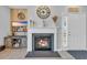 Charming living area with fireplace, TV, and inviting décor, all bathed in natural light at 503 20Th Ave. N # 45D, North Myrtle Beach, SC 29582