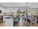 Modern kitchen with white cabinets, dark countertops, stainless steel appliances, and a view to the backyard at 503 20Th Ave. N # 45D, North Myrtle Beach, SC 29582