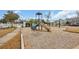 Fun playground with a slide, climbing wall, and swings, perfect for active outdoor play at 503 20Th Ave. N # 45D, North Myrtle Beach, SC 29582