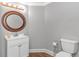 Modern bathroom with a white vanity, bronze fixtures, and a minimalist design at 510 21St Ave. N, North Myrtle Beach, SC 29582
