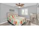 Nicely decorated bedroom with wood floors, ceiling fan, and soft lighting at 510 21St Ave. N, North Myrtle Beach, SC 29582