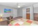 Comfortable bedroom featuring neutral walls, wood floors, ceiling fan, and a large closet at 510 21St Ave. N, North Myrtle Beach, SC 29582