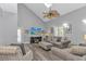 Comfortable living room featuring modern flooring, a ceiling fan, and a mounted television for entertainment at 510 21St Ave. N, North Myrtle Beach, SC 29582