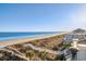 Stunning beach view from a home with a private walkway and ocean access at 5100 Ocean Blvd. N, North Myrtle Beach, SC 29582