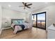 Bedroom featuring an ocean view, wood floors, and modern décor at 5100 Ocean Blvd. N, North Myrtle Beach, SC 29582