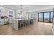 Modern kitchen with a large island, stainless steel appliances, and ocean views, perfect for culinary enthusiasts at 5100 Ocean Blvd. N, North Myrtle Beach, SC 29582
