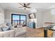 Inviting living room with ocean views, plush seating, and access to a balcony at 5100 Ocean Blvd. N, North Myrtle Beach, SC 29582