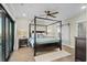 Bedroom with four-poster bed and ocean view at 5100 Ocean Blvd. N, North Myrtle Beach, SC 29582