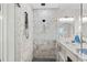 Shower showcasing marble tiling and a contemporary shower head fixture at 5100 Ocean Blvd. N, North Myrtle Beach, SC 29582