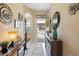 Inviting foyer with tile flooring, stylish decor, and a view into the home at 545 Tourmaline Dr., Little River, SC 29566