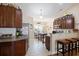Modern kitchen featuring granite countertops, stainless steel appliances, and breakfast bar at 545 Tourmaline Dr., Little River, SC 29566