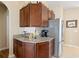 Granite countertops and stainless steel appliances make for a modern kitchen aesthetic at 545 Tourmaline Dr., Little River, SC 29566