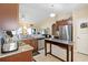 Spacious kitchen with stainless steel appliances, granite counters, and an island workstation at 545 Tourmaline Dr., Little River, SC 29566