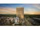 Beautiful sunset aerial view of condo complex with swimming pool and surrounding landscape at 5523 N Ocean Blvd. # 1101, Myrtle Beach, SC 29577