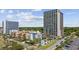 Stunning aerial view of a beachfront condo complex with a pool and surrounding palm trees at 5523 N Ocean Blvd. # 1101, Myrtle Beach, SC 29577