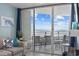 Balcony with ocean views, accessible from living room with comfortable seating and table at 5523 N Ocean Blvd. # 1101, Myrtle Beach, SC 29577