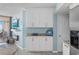 Bright kitchen with white cabinets, stainless steel appliances, and a granite countertop at 5523 N Ocean Blvd. # 1101, Myrtle Beach, SC 29577