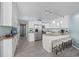 Kitchen with seating, stainless steel appliances, granite counters, and adjacent cabinets at 5523 N Ocean Blvd. # 1101, Myrtle Beach, SC 29577