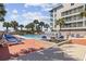 Resort-style pool area surrounded by manicured landscaping and lounge chairs, ideal for relaxing at 5523 N Ocean Blvd. # 1101, Myrtle Beach, SC 29577